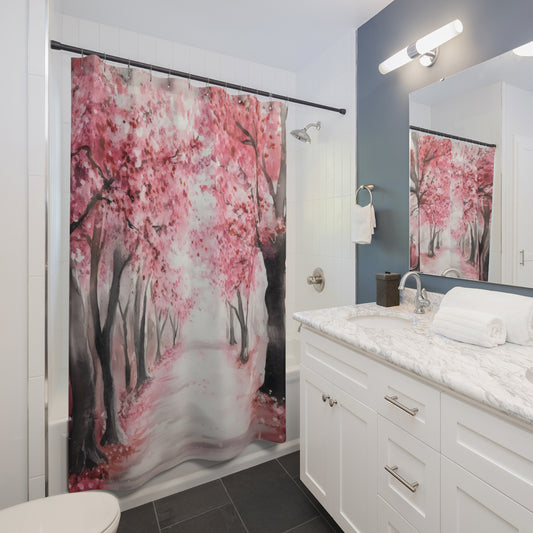 Bathroom with white vanity and pink floral shower curtain featuring cherry blossom trees.