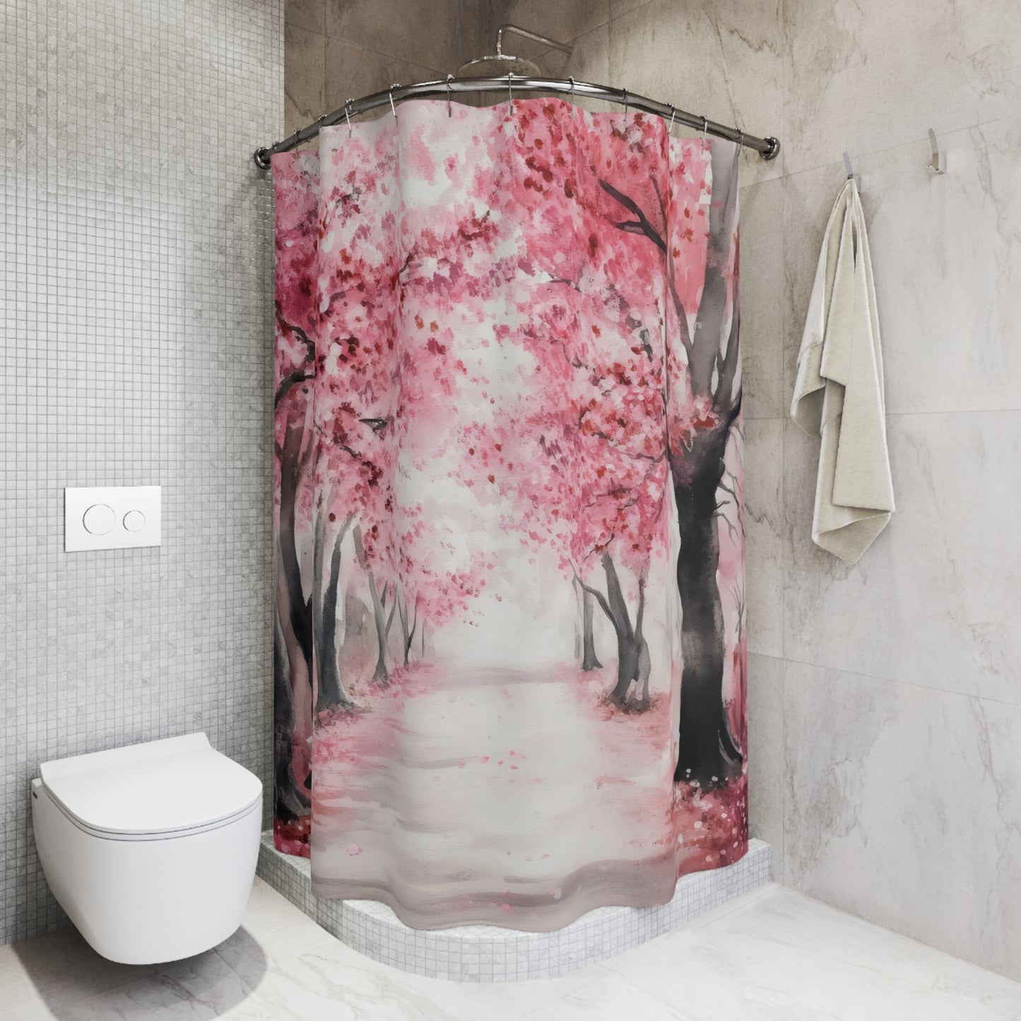 Modern bathroom with a pink cherry blossom shower curtain and folded towel on wall