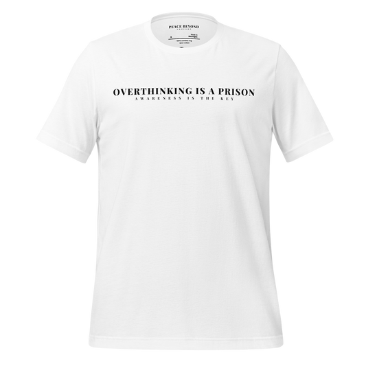 White T-shirt with the words “Overthinking is a Prison – Awareness is the Key” in minimalist typography – PeaceBeyondThought mindfulness liberation apparel.
