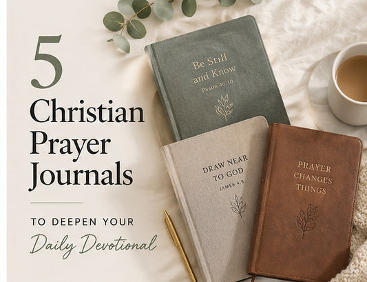 Three Christian prayer journals with Bible verse covers on a soft neutral background