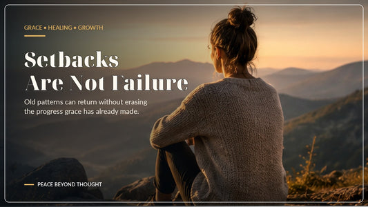 Woman reflecting at sunrise over a mountain valley, symbolizing grace, healing and moving through setbacks without seeing them as failure.