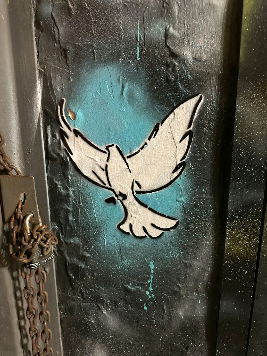 White dove stencil on a textured background