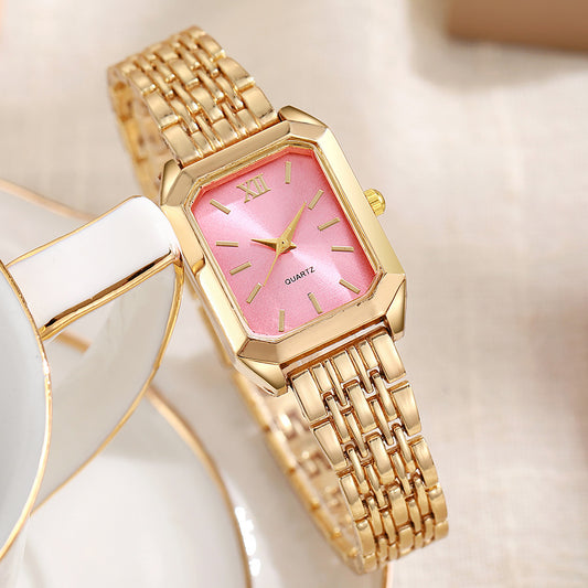 Gold-tone rectangular bracelet watch with a pink dial