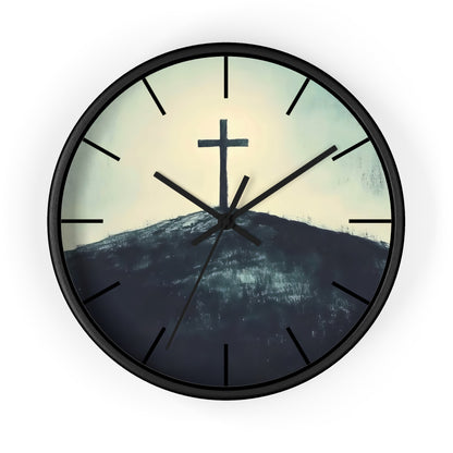 Christian wall clock with a cross on a hill at sunrise
