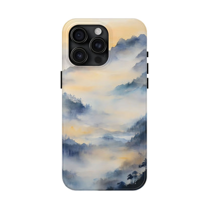 Phone case with misty mountain landscape in soft blue, gray, and golden tones.