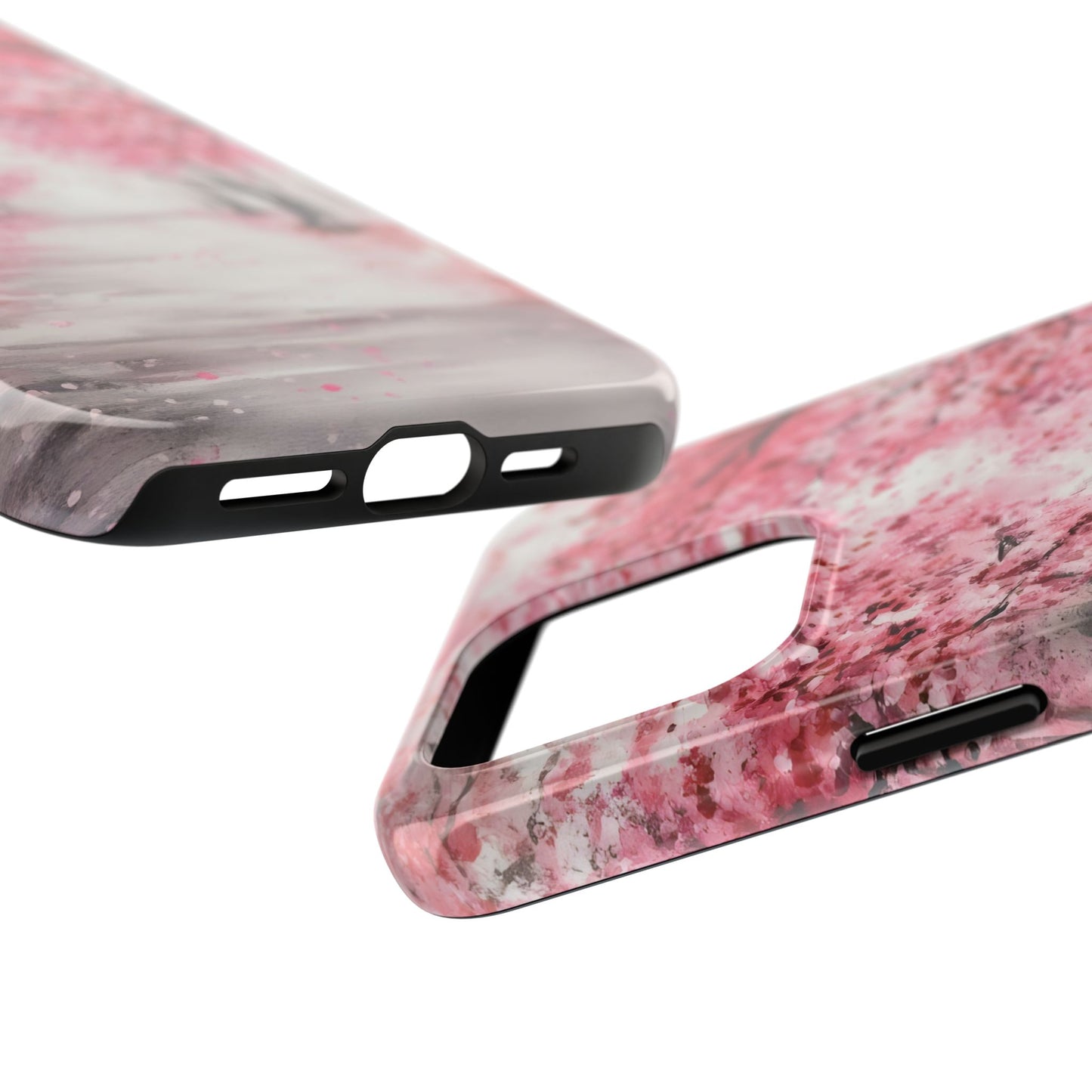 Close-up of pink marble phone cases with a glossy finish and precise cutouts