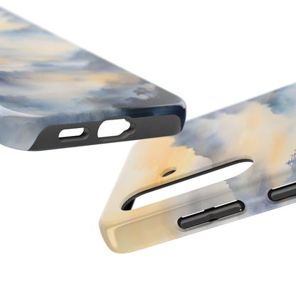 Phone cases with abstract watercolor design in blue and yellow tones, close-up view.