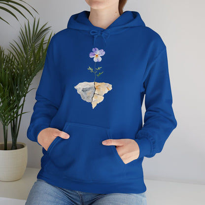 Blue hoodie with watercolor flower and cracked stone graphic, casual faith-inspired apparel