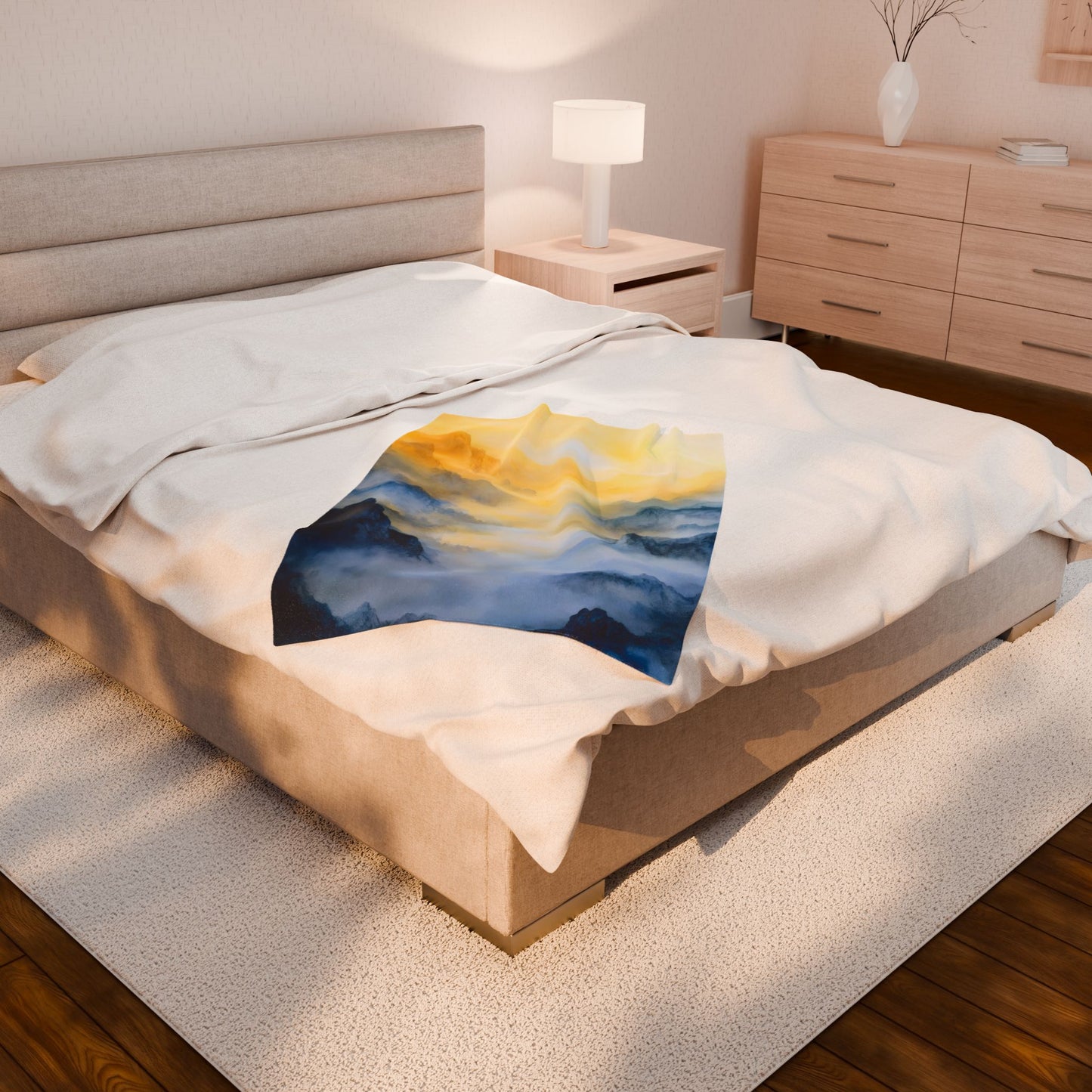 Cozy bedroom with a bed featuring a spiritual mountain landscape blanket, soft lighting, modern decor.