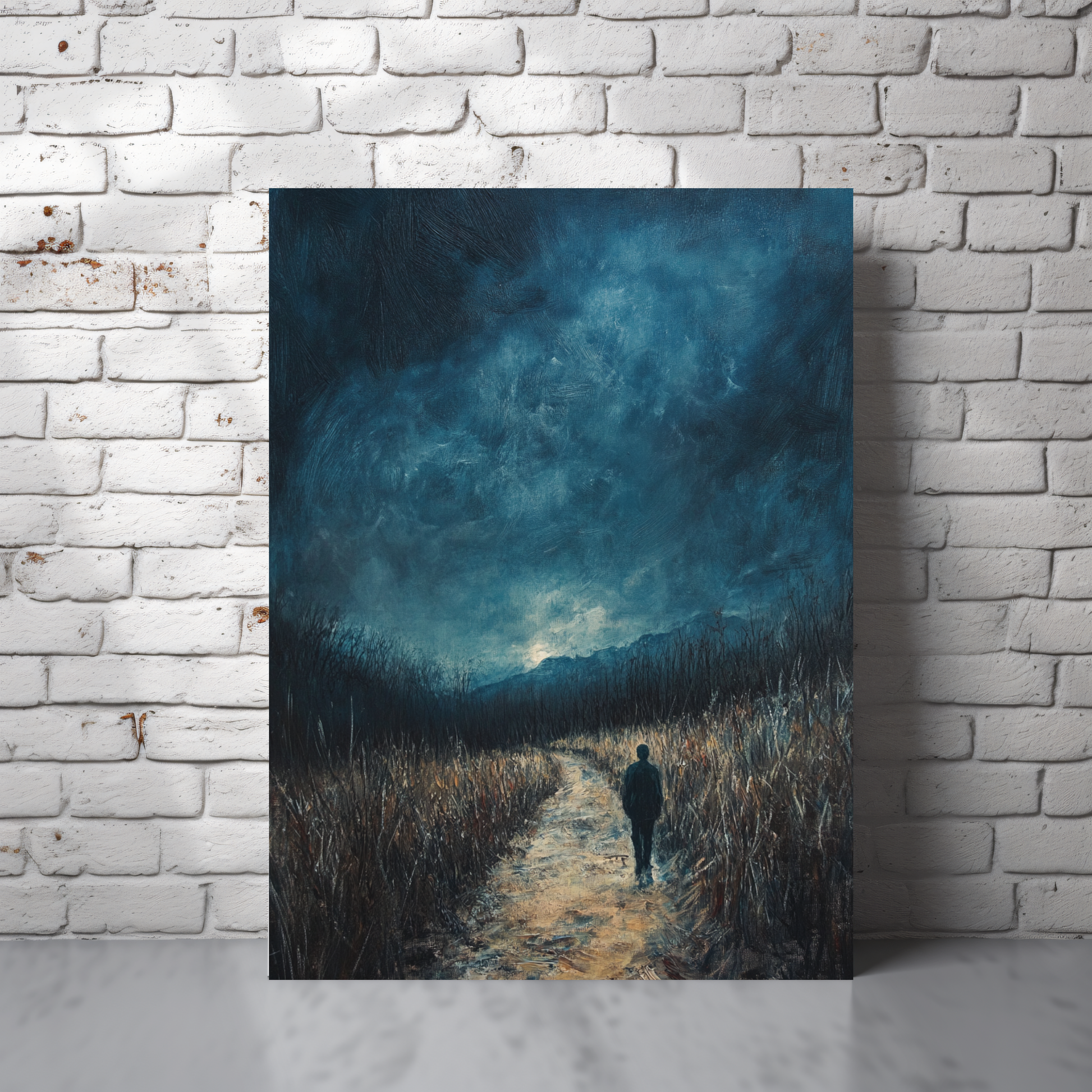 Moody landscape wall art with person walking a path under dramatic blue sky, spiritual decor