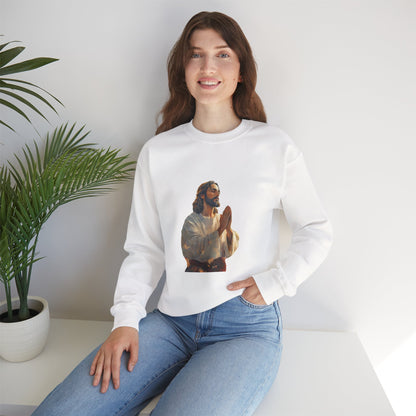 Smiling woman in white sweatshirt with praying Jesus graphic, casual Christian apparel.