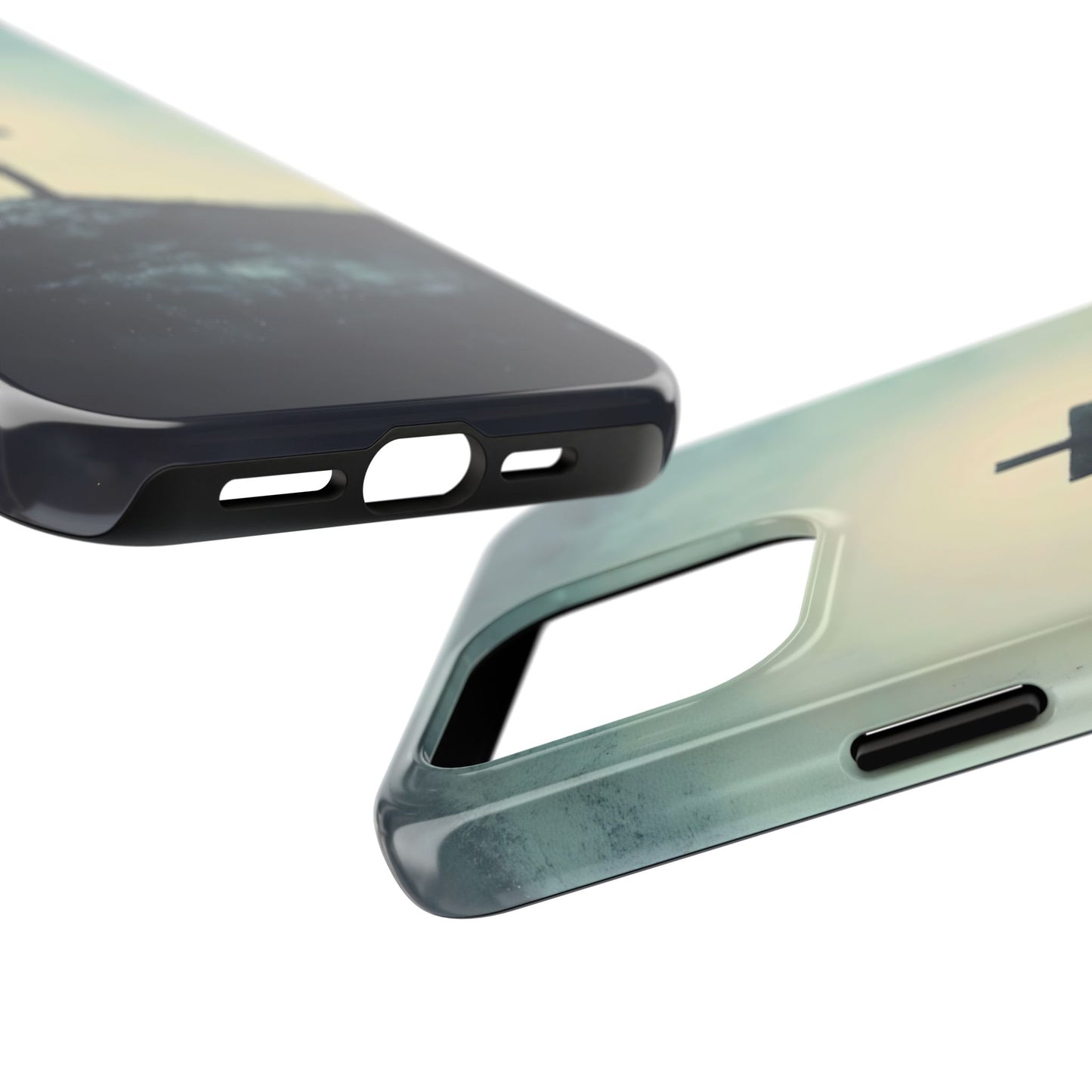 Close-up of two phone cases with serene cross design and soft sunrise colors