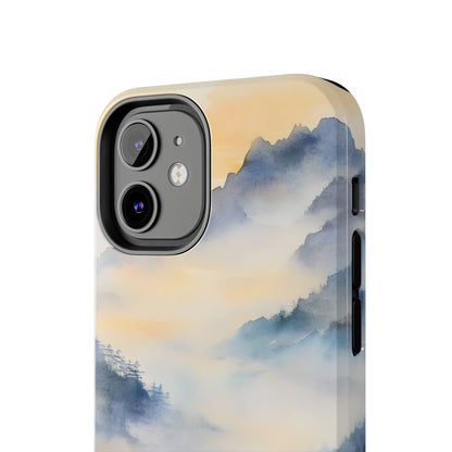 Phone case with serene watercolor mountain landscape in misty blue and gold tones