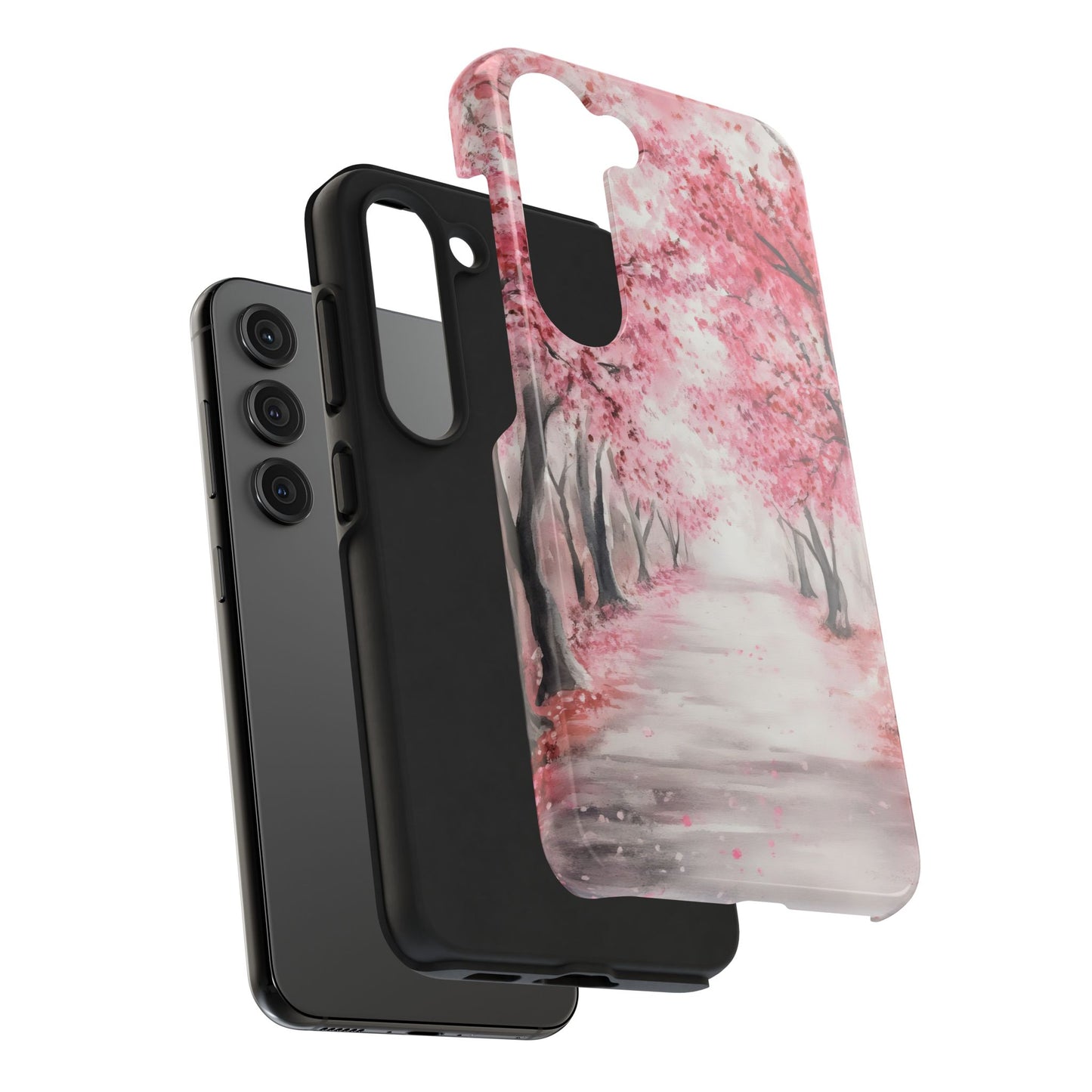 Samsung phone with two cases, one solid black and one with pink cherry blossom tree art