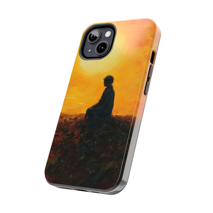 Phone case with silhouette of person meditating at sunset, spiritual art design