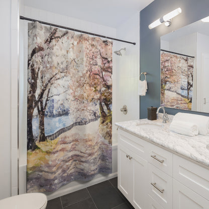 Bathroom with marble countertop and artistic shower curtain featuring a serene landscape with trees.