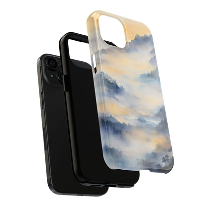 Phone cases featuring serene misty mountain landscape art with soft blue and gold hues