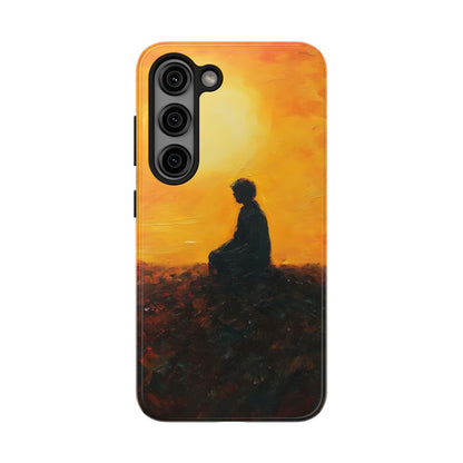Phone case with silhouette of meditating person at sunset, spiritual and mindful art design