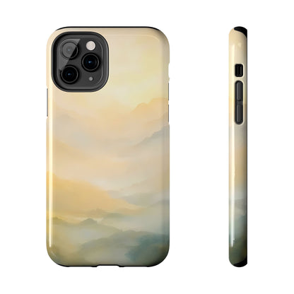 Phone case with serene pastel mountain landscape watercolor design, soft gold and blue tones