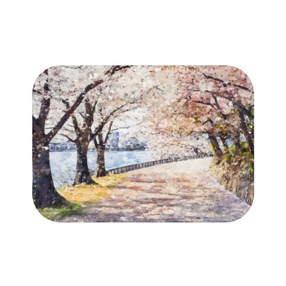 Watercolor-style wall art depicting a peaceful riverside path lined with blossoming trees