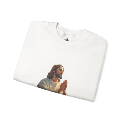 White Christian sweatshirt with serene praying figure graphic, folded on a white background