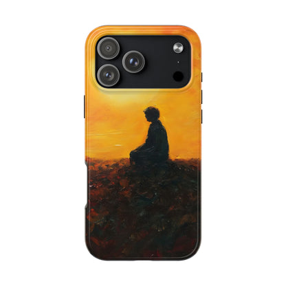 Phone case with silhouette of person meditating against a warm sunset background, spiritual art