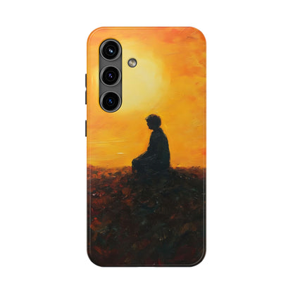 Phone case with silhouette of person meditating at sunset, spiritual art design