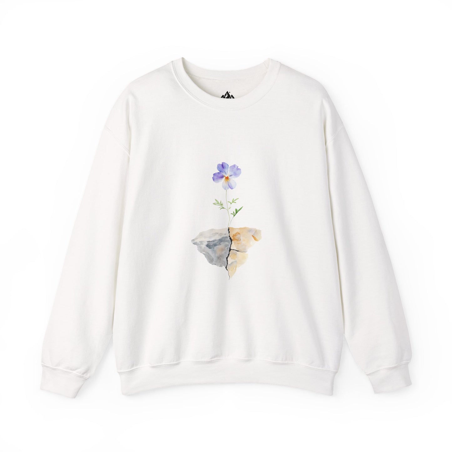 White sweatshirt featuring a purple flower growing from a cracked rock graphic, faith-inspired design
