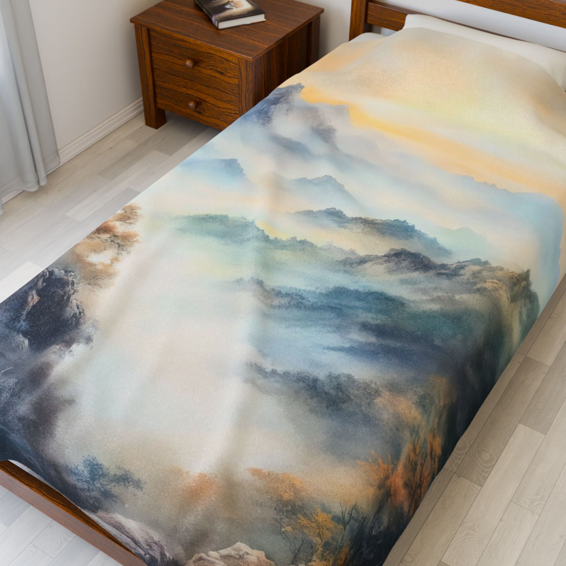 Serene watercolor mountain landscape bedding on a wooden bed in a peaceful bedroom