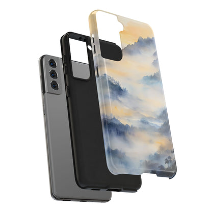 Phone case with serene mountain landscape watercolor design in blue and gold hues