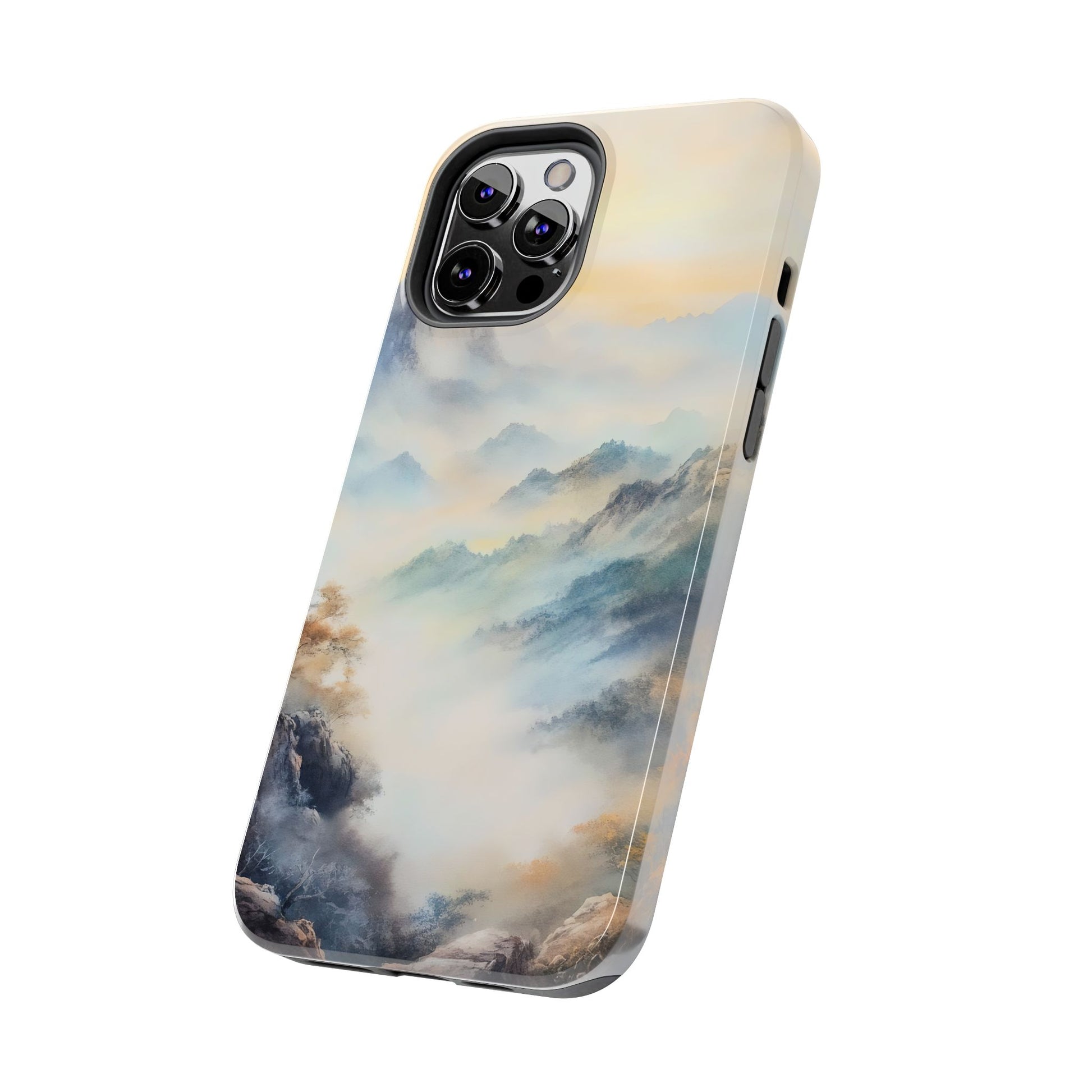 Phone case featuring a serene mountain landscape with mist and soft pastel colors.