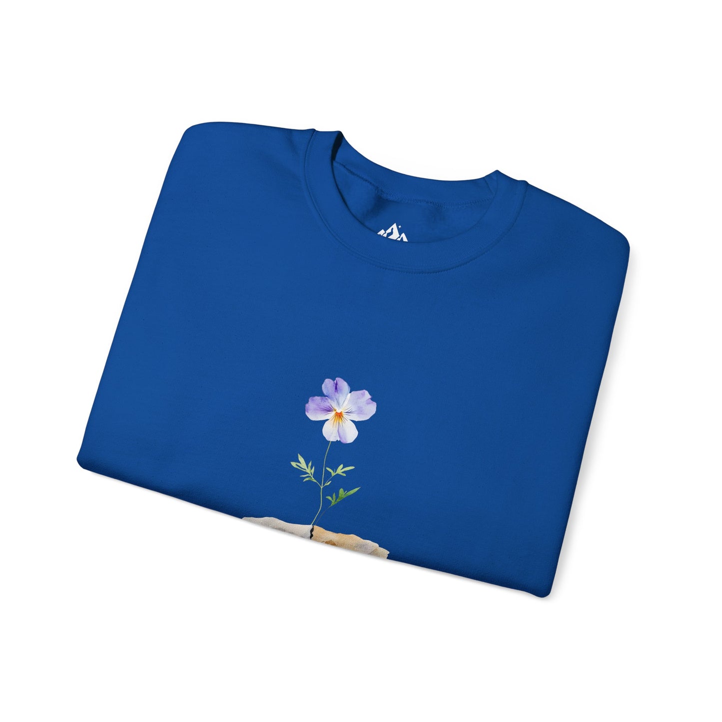 Blue Christian t-shirt with watercolor flower and stone design, folded on white background