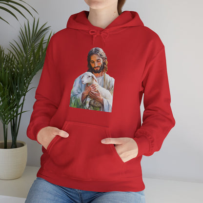 Woman wearing red hoodie with Jesus holding lamb graphic, Christian faith-based apparel