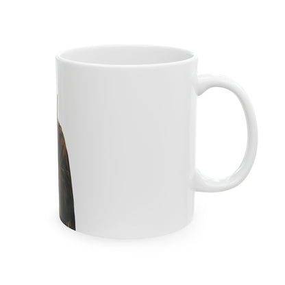 White ceramic coffee mug with partial Christian-themed artwork on the left edge