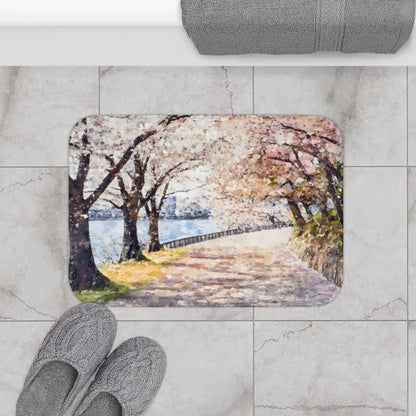 Bathroom floor mat with watercolor cherry blossom path by a river, peaceful home decor