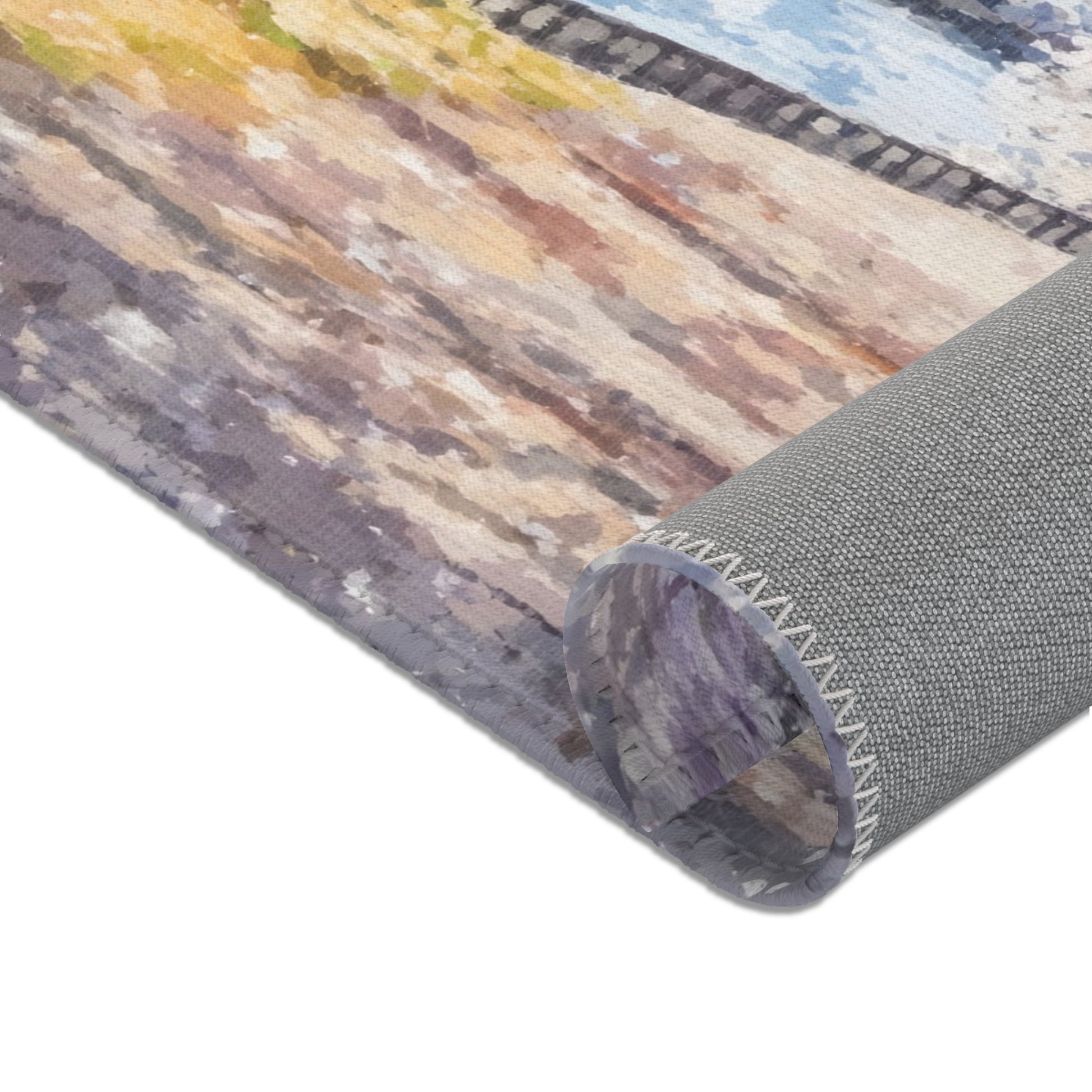 Close-up of rolled Christian wall art canvas with abstract, colorful landscape design
