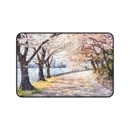 Cherry Blossom Path desk mat with spring riverside sakura landscape