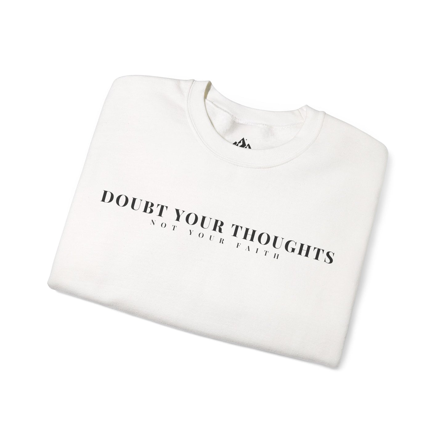 Folded white Christian sweatshirt with 'Doubt Your Thoughts Not Your Faith' minimalist text design