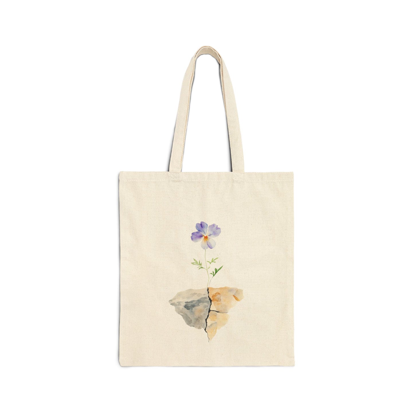 Natural cotton tote bag with a purple watercolor flower growing from cracked rocks, minimalist design