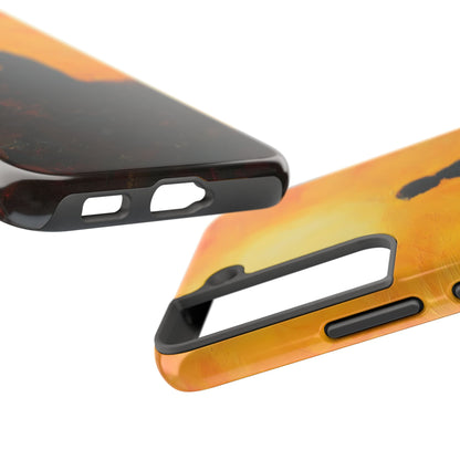 Close-up of Christian-themed phone case with silhouette design on orange-yellow background