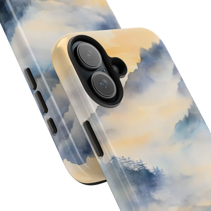 Close-up of phone case with soft watercolor landscape, blue and beige misty mountains design