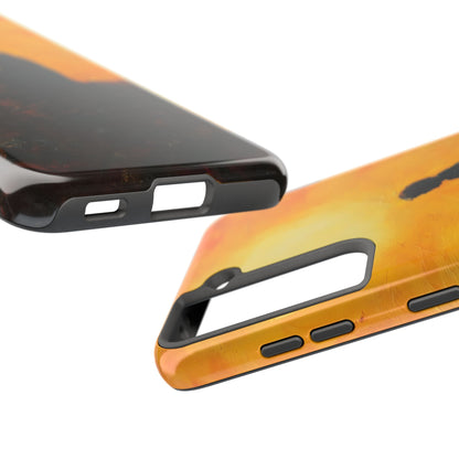 Christian-themed phone cases with sunrise orange and black design, close-up view
