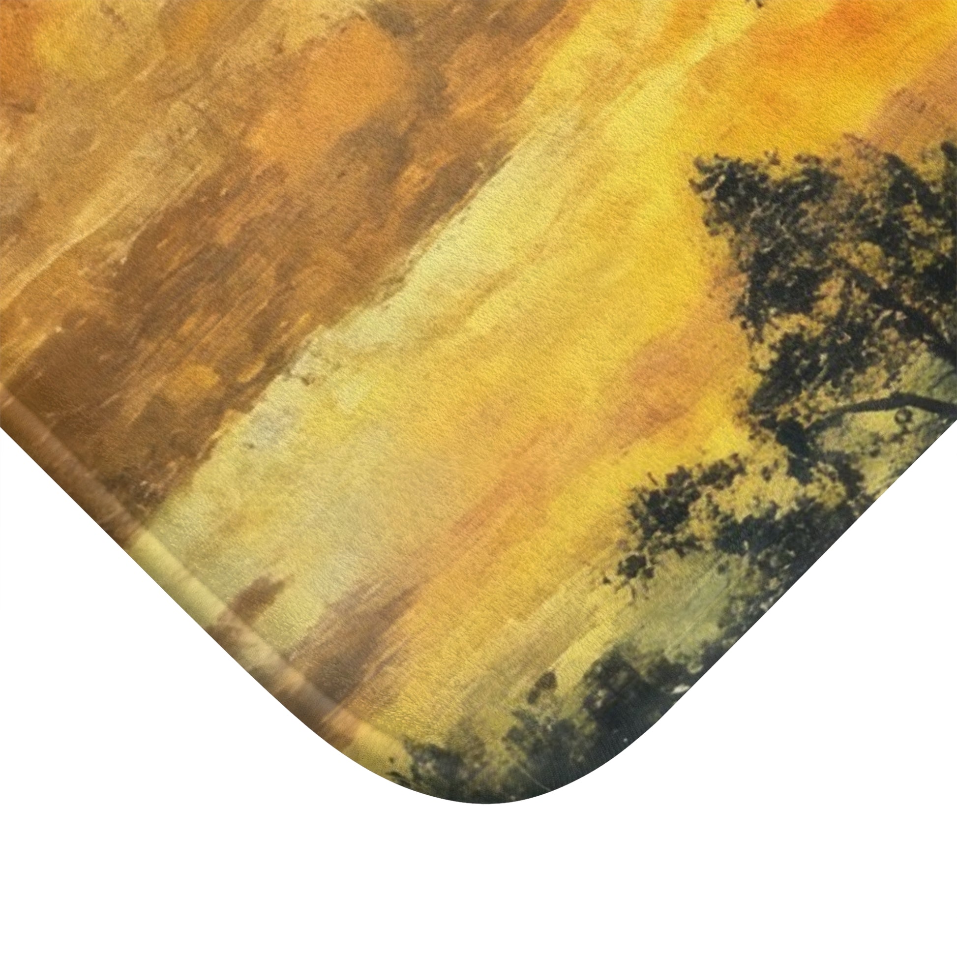 Christian wall art detail with yellow, orange sky and black silhouette trees