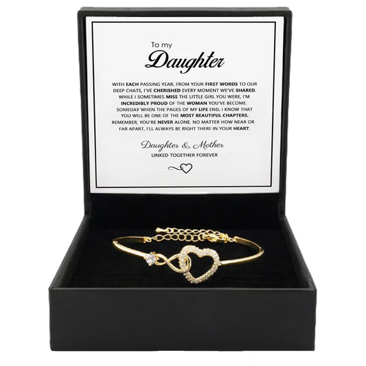 Linked-heart bracelet in a black Daughter message-card gift box
