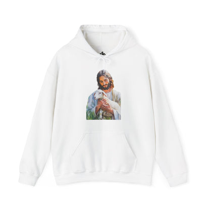 White Christian hoodie featuring artwork of Jesus gently holding a lamb, faith-inspired apparel
