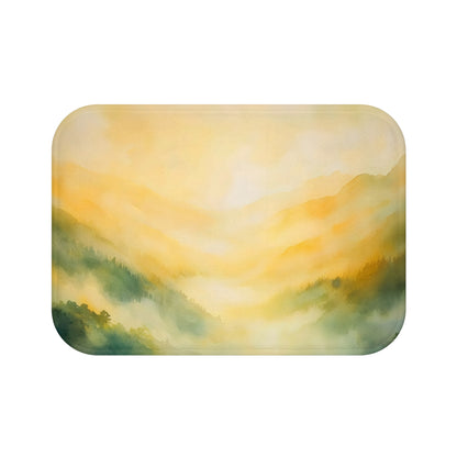 Watercolor landscape bath mat featuring misty mountains in yellow and green hues