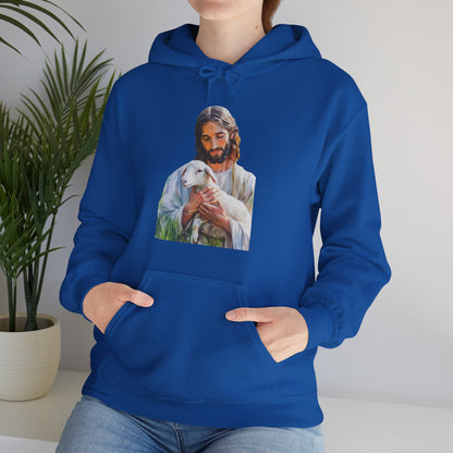 Woman wearing blue Christian hoodie with artwork of Jesus holding a lamb