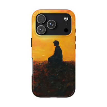Phone case with silhouette of person meditating at sunset in contemplative landscape art