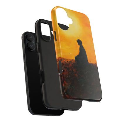 Phone case with silhouette of person meditating at sunset, spiritual art design