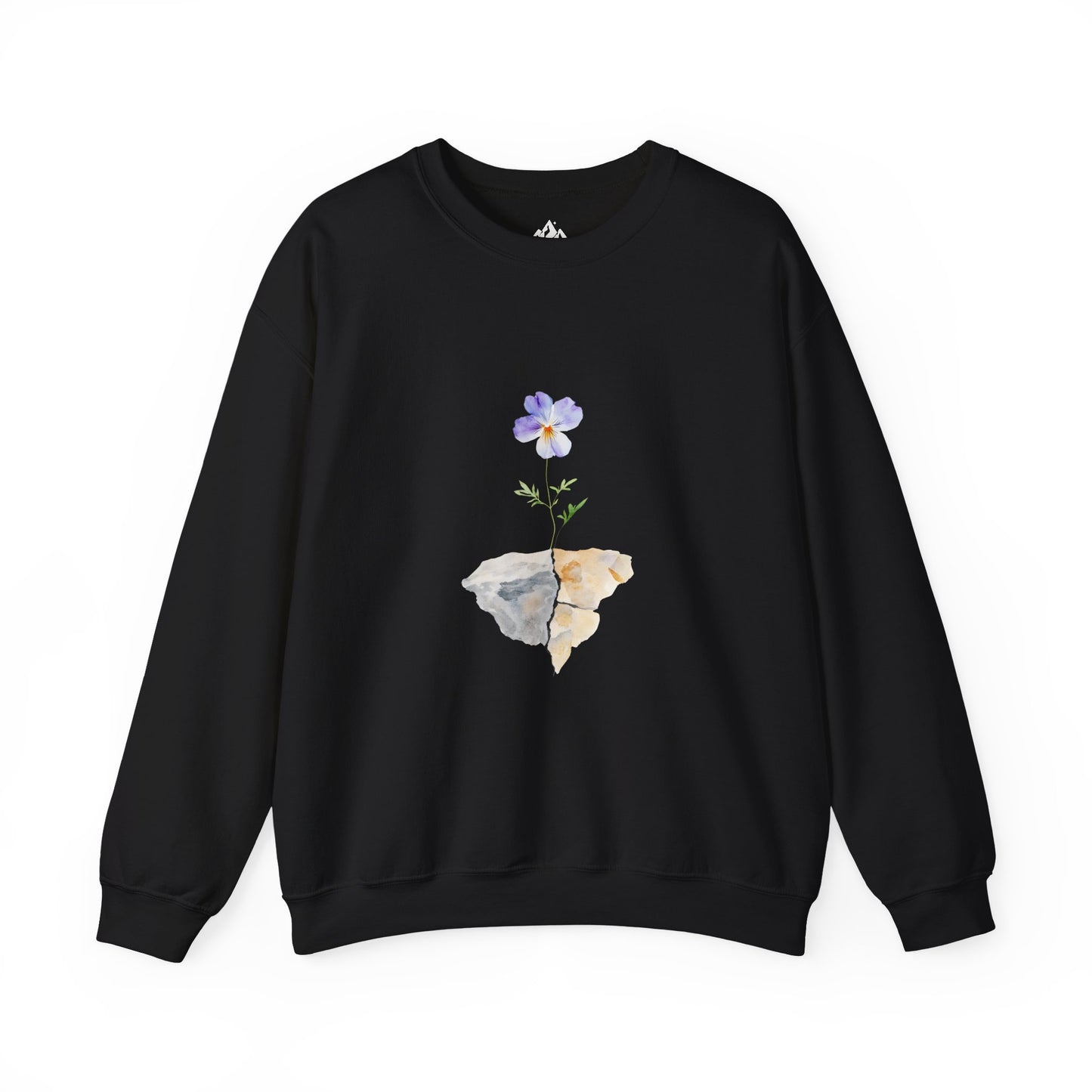 Black crewneck sweatshirt with a purple flower growing from cracked rocks, minimalist design